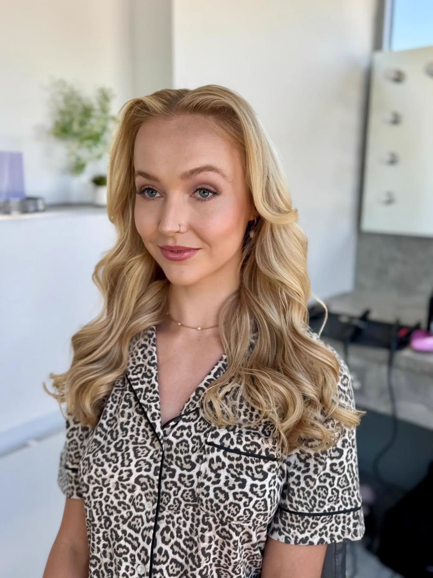 Blonde bride with vintage waves and soft glam makeup by Be Bridal