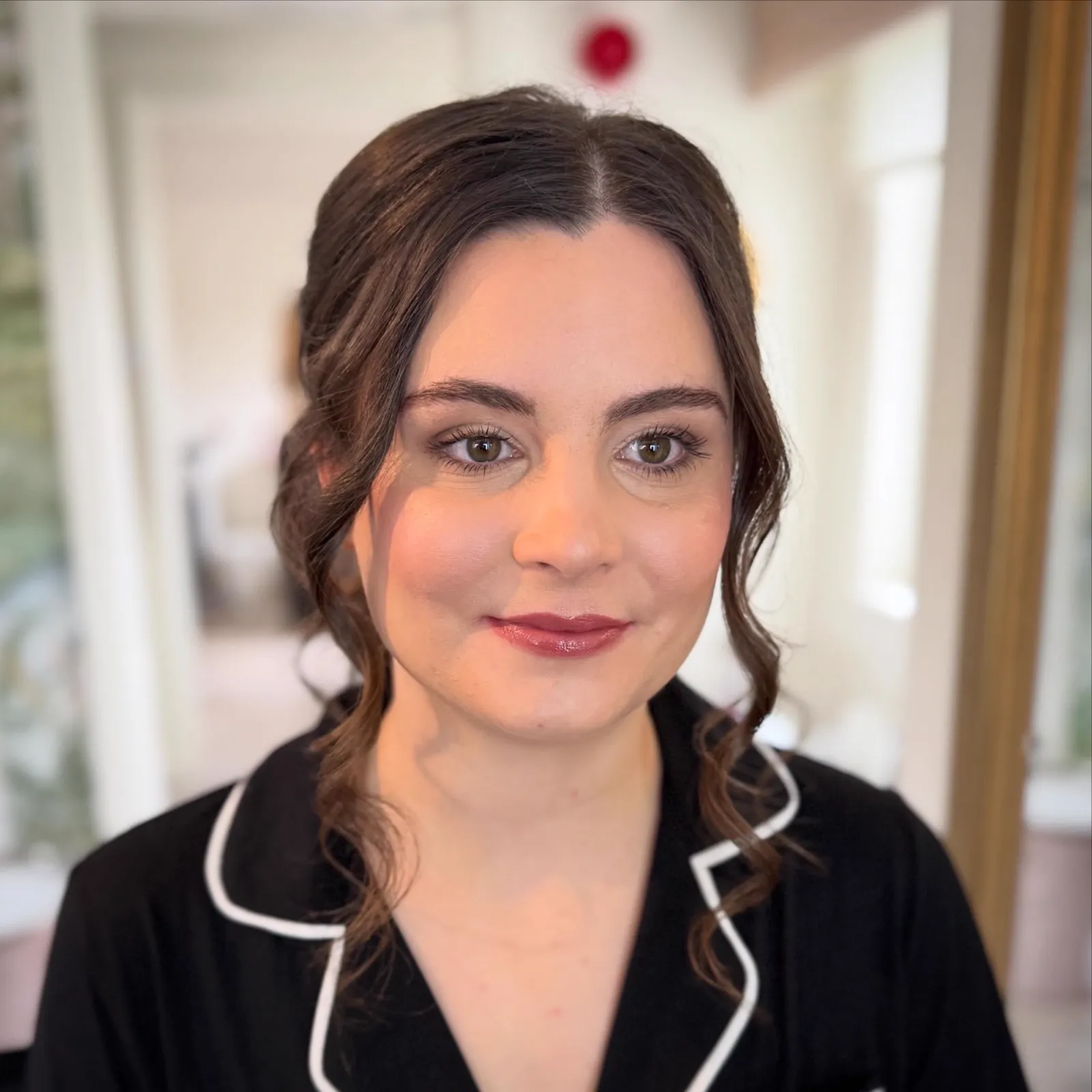 Soft glam makeup with swept-back curls and a berry lip by Be Bridal