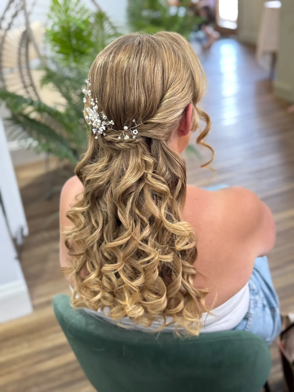 Half-up bridal curls with a pearl and crystal hair vine by Be Bridal