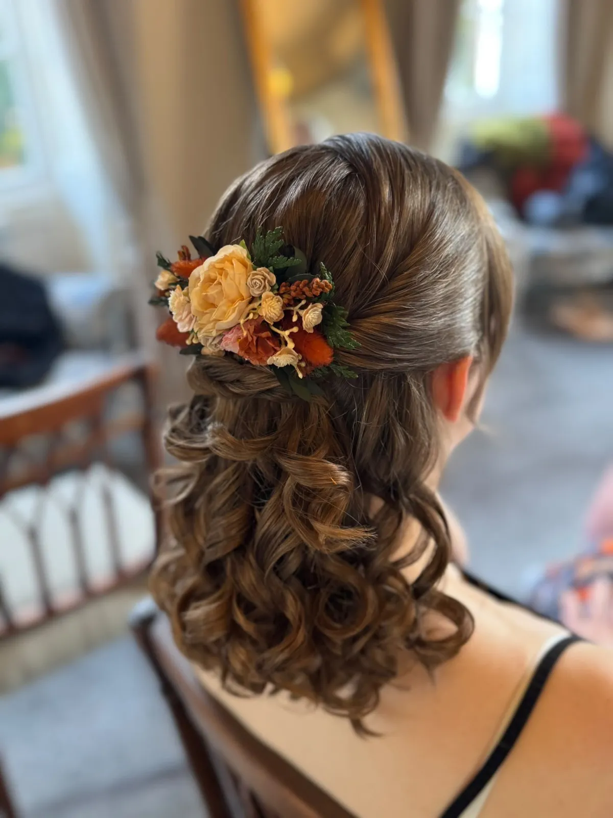Half-up bridal curls with an autumn floral hair comb by Be Bridal